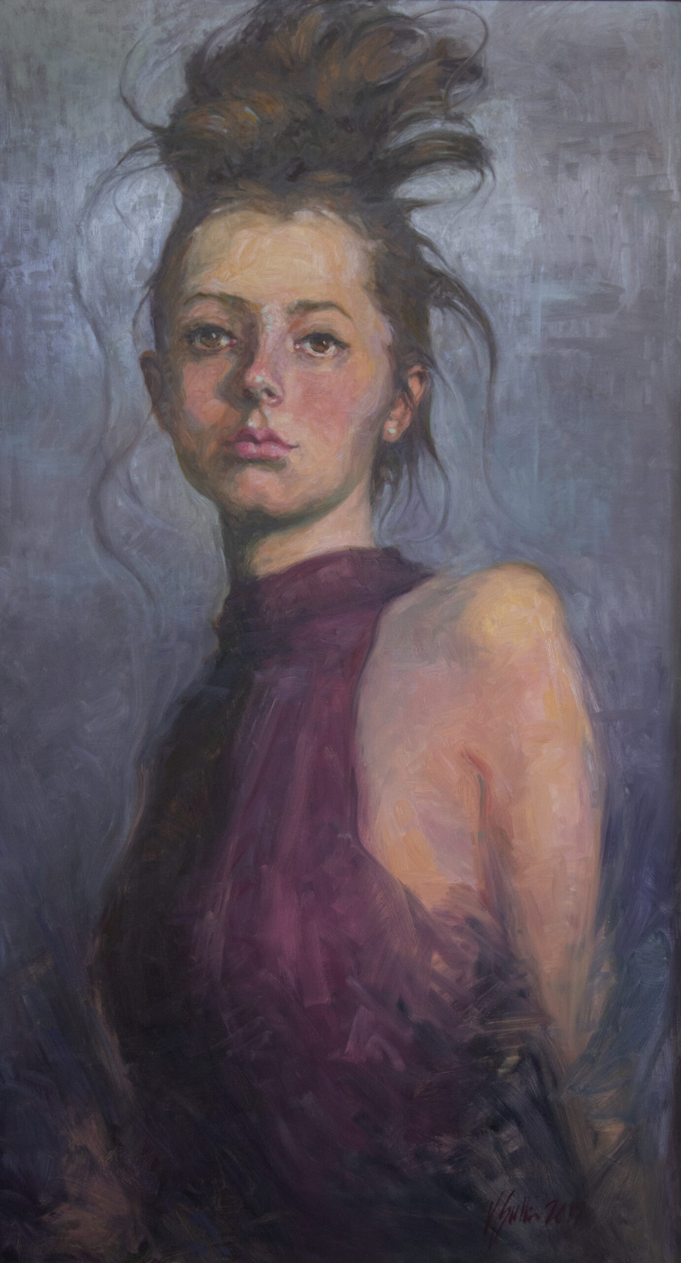 portrait of a young woman with hair in a wild bun in blues and flesh tones